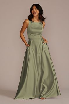 a woman in a long green dress