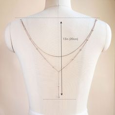 The ultimate backdrop jewelry for a V-shape low back dress! This Y Lariat Cubic Zirconia chain back jewelry is the perfect accessory. Easy to wear, clips onto your dress. .925 Sterling Silver Cubic Zirconia Crystals, 5mm Hypoallergenic, lead and nickel free Back Length 12 in (30 cm) Note:You must attach loops to dress in order to clip back jewelry #NBC053 2-3 business days Low Back Dress, Low Back Dresses, Back Necklace, Back Jewelry, Back Dress, Low Back, Bridal Accessories, V Shape, Body Jewelry