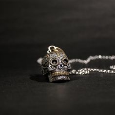 Calavera Sugar Skull Necklace, made of 925 Sterling Silver 👊🏽 Tag a someone who'd love this ☠️    #detailedskulljewelry #sugarskull #coolskulljewelry #uniqueskulljewery #skullpendant #sugarskullpendant #bikerjewelry #necklaceforbikers #unisexjewelry #detailednecklace #sterlingsilver #925 #calavera #calaverasugarskull Sugar Skull Necklace, The Whispers, Skull Pendant Necklace, Biker Jewelry, Detailed Necklace, Skull Jewelry, Skull Necklace, Skull Pendant, Men's Necklace