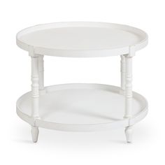 a white coffee table with two tiers on each side and one shelf below it