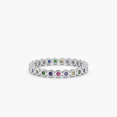 bezel set white gold ring Elegant Multicolor Stackable Eternity Band, Multicolor Round Sapphire Gemstones, Multicolor Sapphire Ring, Multicolor Round Gemstones With Prong Setting, Multicolor Stackable Sapphire Ring Fine Jewelry, Multicolor Multi-stone Diamond Birthstone Ring, Rainbow Multi-stone Sapphire Jewelry, Multicolor Round Bezel Set Jewelry, Multicolor Round Jewelry With Bezel Setting