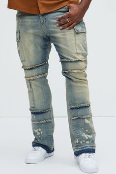 Available In Medium Wash. Stacked Skinny Flare Fit Stretch Denim 98% Cotton 2% Elastane Disclaimer: Due To The Wash Process Each Garment Is Unique. Zip Fly Button Closure Cargo Pockets Fray Detail Bleach Detail Open Hem Imported | Mens Side Snap Cargo Stacked Skinny Flare Jeans in Medium Wash size 34 by Fashion Nova Rugged Fitted Distressed Bottoms, Rugged Distressed Fitted Bottoms, Ripped Fitted Cargo Jeans, Ripped Fitted Casual Cargo Jeans, Fitted Ripped Casual Cargo Jeans, Casual Ripped Fitted Cargo Jeans, Distressed Fitted Cargo Jeans, Rugged Fitted Washed Jeans, Distressed Fitted Straight Leg Cargo Jeans