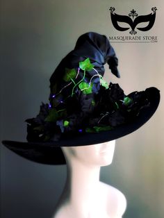 Embrace the spirit of the season with this Witch Hat adorned with fall leaves. The rustic charm of autumn is captured in this unique accessory, making it perfect for Halloween, theatrical performances, or any cosplay event. With its blend of earthy tones and enchanting design, this hat is sure to add a touch of magic to any outfit. Age Group/Gender - Adult/Unisex Size/Type - One size fits all adults Hat Base Color - Black Hat Material - Fabric Hat Base, The Witch, Black Hat, Halloween Cosplay, Witch Hat, Fall Leaves, Earthy Tones, Accessories Unique, Rustic Charm