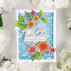 a card with flowers on it and the words, take joy in the little things