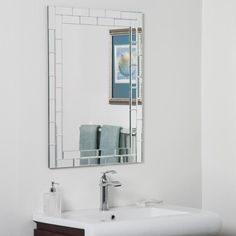 a bathroom sink with a mirror above it