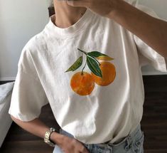 Aesthetic Graphic Tee, Vintage Shirt, Graphic T-shirt, Aesthetic Tee, Oranges Shirt, Orange Tee, Comfort Colors Tshirt, Orange Tshirt, Boho Shirt, Pastel Drawing, Aesthetic Graphic Tee, Vintage Graphic Tee, Vintage Orange Tee ✧ Comfort Colors® T-Shirt ✧ Relaxed fit t-shirt ✧ Design is scaled down on smaller sizes. ✧ 100% US cotton (fiber content may vary for different colors) ✧ Medium heavy fabric ✧ Runs bigger than usual women's t-shirt ✧ Take a look at the photos to see a specific sizing chart Graphic Shirt Aesthetic, Vintage Graphic Shirt, Aesthetic Fruit, Fruit Shirt, Vegetable Plants, Peach Shorts, Shirt Aesthetic, Shirt Art, Casual Summer Tops