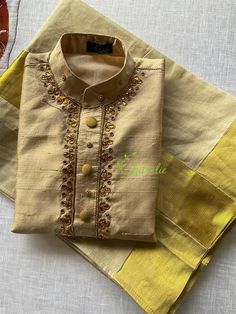 The Outfit consists of Kurtha and Mundu.The Kurtha made of Rawsilk fabric and is embellished with maggam work.The quality and embellishments makes this unique.The Mundu is made of premium quality Kerala Handloom Kasavu fabric.Velcro pasting at waist. So it’s easy to wear for kids.The Kurtha is lined with soft cotton fabric.Size: The picture shows 5-7 year baby boys dress.Any customisation of colours of Kurtha, please let me know. Onam Dress Kerala, Kerala Traditional Dress, Traditional Dresses For Kids, Onam Dress, Boys Costumes, Boy Dress, Baby Boy Dress, Maggam Work, Boy Costumes