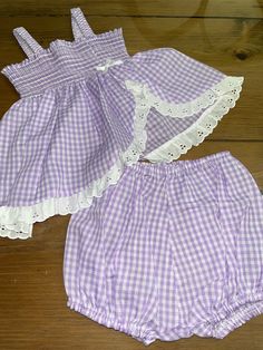 "No tags size or fabric - a vibrant, purple and white with eyelet trim. Trim sunsuit ensemble / elastic is fully functional.Bloomers measure waist 7 1/2\"-10\" on flat lay & length (waist to crotch intersection) 9\"/ top pit to pit approx 8\"-10\" / waist 7\" - 10\" / length (shoulder straps fully extended to bottom) 13\"/ Strapp elastic is approximately 3 inches as seen in last photo, but stretches to 4 inches with no problem / good clean condition with no issues - smoke-free environment (87)" Spring Gingham Bubble Romper With Ruffles, Spring Cotton Sets With Lace Trim, Cotton Sets With Lace Trim For Spring, Cute Gingham Bubble Romper For Spring, Cute Spring Gingham Bubble Romper, Cute Summer Bloomers With Ruffles, Purple Ruffled Sets For Spring, Spring Purple Ruffled Sets, Spring Gingham Bubble Romper For Playtime