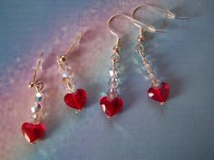 "Valentine Earrings Swarovski Crystal Heart These sparkly. festive earrings are made from Swarovski crystal heart beads in light siam and Swarovski crystal 4mm clear AB finish.  They are available in posts or french hooks, both of which are hypoallergenic, please select when adding to your cart.  Earring length is just over 3/4\" from the earwire" Valentine Diy Jewelry, Diy Valentines Earrings, Valentines Beaded Earrings, Valentine’s Day Jewelry, Valentine Earrings Diy, Swarovski Earrings Diy, Valentine Jewelry Ideas, Heart Earrings Diy, Body Jewelry Diy