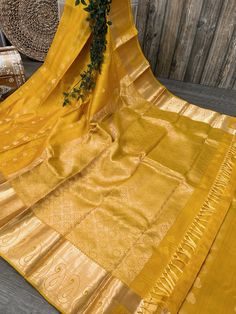 Bright and festive turmeric yellow pure silk saree with self checks pattern and zari motifs. -Pure Kanchipuram silk saree authenticated by Silk Mark Certificate. -Blouse fabric included. -Fall attached. Note:  - Slight inconsistency in weaving is inherent to handloom sarees and is not a defect. -The color of the products may slightly vary according to the ambient lighting conditions and the color calibration of LED devices. If you would like more clarity before your purchase, please drop us a message . Luxury Yellow Banarasi Silk Dupatta, Yellow Kanjivaram Saree Silk, Turmeric Yellow, Checks Pattern, Kanjivaram Sarees Silk, Silk Saree Kanchipuram, Kanjivaram Silk Saree, Saree Silk, Yellow Saree