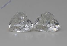 This pair of loose diamonds is a winner! She will love these natural earth mined Heart shaped loose diamonds. The combined carat weight of these diamonds is 0.92. The color of the diamonds is I and the clarity is SI1-SI2. The measurements of the pair in mm are: 5.20x4.90. All our diamond jewelry and loose diamonds arrive in a classic jewelry box and come with a 30-day return policy. Types Of Diamonds, Star Earrings Stud, Diamond Education, Heart Shaped Diamond, Classic Jewelry, Natural Earth, Love Bracelets, Wedding Bracelet, Star Pendant