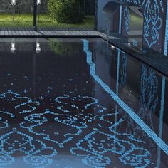 an artisticly designed swimming pool is shown in this image