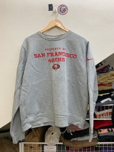 📌 BUY MORE AND SAVE MORE!! ADDITIONAL EACH ITEM $5 FOR  SHIPPING* Hi All!! May our beloved customer have a great day😁 ✅ I Just go back from thrift and found A vintage sweatshirt NFL SAN FRANCISCO TRAINING  L grey.  😻 ✅PLEASE READ THE DESCRIPTION BELOW BEFORE PURCHASING. ✅ pit 25 inch X length 27 inch length... a great vintage SF 49ers NFL sweatshirt ✅RARE AND FAST SELLING ITEm! ✅Payment Method & Shipping - Item will be ship along with Tracking Number after received a complete payment. Using F Fall Season Sportswear Sweatshirt For Fan Gear, Team Spirit Logo Print Sweatshirt For Game Day, Team Spirit Sweatshirt With Logo Print For Game Day, Fleece Sportswear Sweatshirt For Fan Gear, Fan Gear Sportswear Hoodie With Crew Neck, Fleece Sweatshirt For Fan Gear, Fleece Sweatshirt For Fan Gear In Sportswear Style, Long Sleeve Fleece Top With Team Logo, College Fan Apparel Sweatshirt With Logo Print