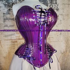 "New overbust corset from \"MystiC City Corsets\" design: MCC-30S (bigger bust/wide hips)  ORIGINAL design/photo: \"MystiC City Corsets\" - color: photo - cotton twill lining steel boning  - 6 x 12mm wide \"white\" flat steel bones (flexible) - 20 x 6mm wide spiral steel bones (flexible) - steel busk (stiff) - boned underbusk for extra stiff front support  - floating modesty panel: 5\" wide ( boned) - high quality silver tone 1/4\" grommets - back lacing: cord corset is recommended for waist tra Metallic Fitted Corset For Party, Fantasy Style Underbust Corset With Boned Bodice, Purple Corset Dress With Fitted Bodice, Overbust Corset With Boning For Cosplay, Fitted Fantasy Corset Dress With Corset Back, Purple Overbust Corset Dress For Costume Party, Purple Corset Dress With Corset Back, Purple Corset Back Dress, Gothic Purple Corset With Corset Back