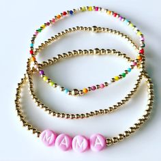 14K gold filled beads, pink mama bracelet, rainbow bracelet, plain gold bracelet set of three. 2.5mm & 3mm beads Plain Gold Bracelet, Mama Bracelet, Bracelet Rainbow, Gold Bracelet Set, Gold And Pink, Rainbow Bracelet, Bracelet Stack, Bracelet Set, Gold Filled