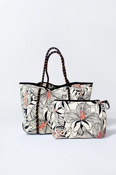 Introducing our exclusive Hibiscus Tote + Pouch Set Bundle – a fusion of tropical allure and practical elegance. Immerse yourself in the vibrant beauty of hibiscus blooms with our meticulously designed tote, adorned with stunning floral patterns that evoke a sense of exotic charm. The accompanying pouch, crafted with the same attention to detail, adds a touch of versatility to your ensemble. Versatile Tote Bag For Beach Season, Versatile Shoulder Bag For Everyday Beach Use, Versatile Shoulder Bag For Everyday Use, Versatile Shoulder Bag With Removable Pouch For Vacation, Casual Travel Bag With Removable Pouch, Summer Bags With Removable Pouch For Everyday Use, Versatile Vacation Bags With Removable Pouch, Sporty Summer Travel Bags, Sporty Travel Bags For Summer