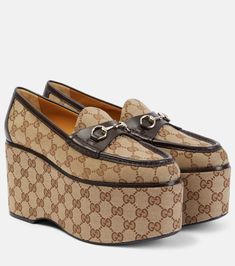 Horsebit GG canvas platform loafers in brown - Gucci | Mytheresa Gucci Platform Loafers, Watches Collection, Canvas Loafers, Gucci Horsebit, Platform Loafers, Beige Shoes, Evening Shoes, Footwear Design Women, Brown Shoe