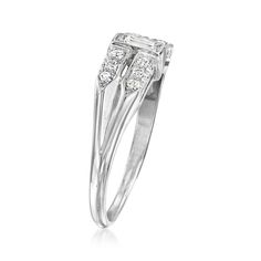 Ross-Simons - C. 1950 Vintage .35 ct. t. w. Diamond Ring in 14kt White Gold. Size 8. C. 1950. Dating back to the Retro era, this fabulous ring from our Estate collection debuts a dazzling .10 carat baguette diamond between .25 ct. t. w. round brilliant-cut diamond rows for a unique split design that calls to mind today's stacked styles. Finely crafted in polished 14kt white gold. 1/4" wide. Diamond ring. Exclusive, one-of-a-kind Estate Jewelry. Diamond birthstones are the perfect gift for April Classic Platinum Cluster Ring With Baguette Cut, Vintage Diamond Ring With Baguette Cut Center Stone, Vintage Baguette Cut Diamond Ring For Formal Occasions, Vintage Baguette Cut Anniversary Ring, Vintage Baguette Cut Ring For Anniversary, Vintage Platinum Diamond Ring With Baguette Cut, Vintage Diamond White Baguette Cut Diamond Ring, Vintage White Diamond Baguette Cut Ring, Vintage Baguette Cut Diamond White Diamond Ring