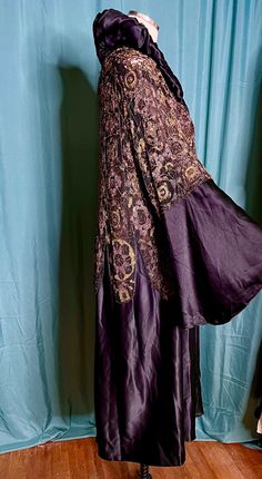 STUNNING and RARE 1920s Flapper Coat! Has extraordinary and intricate purple and gold beading with metallic embroidery. Bell Sleeves and black silk. Has dramatic collar! The size is medium to large. Mannequin is approximately size 6-8 US womens. I've never come across anything like it! Messages with questions! Item is being sold AS IS! Condition is good but it appears to have been previously repaired in the beading area. We can make no warranty or claims for any vintage items. Please ask questio Purple And Gold Outfit, Gold Outfit, Vintage Coat, Historical Dresses, Black Silk, Purple Gold, Gold Beads, Dress Clothes For Women, Bell Sleeves