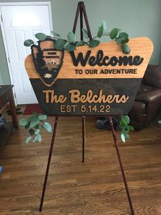 a welcome sign in front of a door