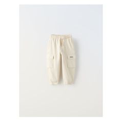 PLUSH CARGO PANTS Cream Cotton Cargo Pants, Cream Cotton Cargo Pants With Pockets, Casual Cream Cargo Pants With Patch Pockets, Casual Cream Cargo Pants With Pockets, Pants With Pockets And Adjustable Waist, White Utility Pants With Elastic Waistband, Casual Cream Bottoms With Side Pockets, Zara Beige Cargo Pants With Pockets, Beige Zara Cargo Pants With Pockets