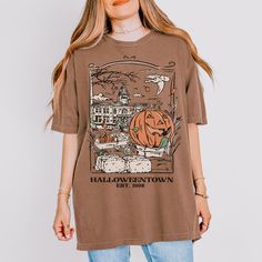 Comfort colors vintage Halloweentown tee. Vintage Graphic Print T-shirt For Fall, Brown T-shirt For Fall Streetwear, Retro Brown T-shirt For Fall, Retro Crew Neck T-shirt For Fall, Spooky Short Sleeve T-shirt For Fall, Brown Graphic Print T-shirt For Fall, Retro Fall T-shirt With Screen Print, Grunge Style Screen Print T-shirt For Fall, Grunge Screen Print T-shirt For Fall