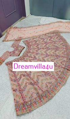 Fabric :  ⏭️ Faux georgette lehenga with paper mirror , zari & thread work  *Flair 3.25 meter* *CAN CAN attach* ⏭️ Faux georgette blouse with paper mirror , zari & thread work all over front & back ( unstitch ) *Tassel border given for blouse waist & sleeves* ⏭️ Faux georgette with paper mirror , thread & zari work  *Weight : 1.550 KG* Wedding Choli With Sequins In Multicolor, Multicolor Sequined Choli For Wedding, Party Wear Sharara With Gota Work In Dola Silk, Multicolor Sequined Lehenga For Wedding, Multicolor Sequined Traditional Wear For Wedding, Multicolor Sequined Sharara For Diwali, Chinon Sharara For Navratri Party, Multicolor Semi-stitched Party Wear Choli, Multicolor Sequined Dupatta For Wedding