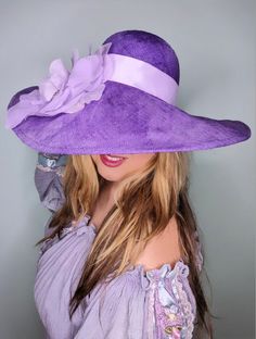 Our Beautiful ' LILAC DREAMER ' hat is your summer essential sun hat.. Made from the highest quality parasisal straw and hand dyed into the most beautiful purple. Featuring a oversized wide brim this hat will keep you cool all summer. Our ' LILAC DREAMER ' is detailed with a lilac satin ribbon around the crown and hand made silk flower with vintage stamens  attached to a hat pin so it can be removable. Headsize : 21- 22 "  Handmade in our Sydney Studio  Our ' LILAC DREAMER ' is made to order and Lilac Hat, 70s Mode, Hat Silk, Headpiece Accessories, Wide Brim Straw Hat, Interesting Outfits, Boho Hat, Flower Hat, Wide Brim Sun Hat