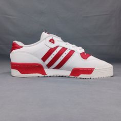 Product Name: Adidas Originals Rivalry Men's Low Sneakers Style Number: Gz9793 Size: Sizes 9.5, 11.5, 12 Color: White, Red Our Shoes Are Brand New And 100% Authentic Or Your Money Back!!! Orders Usually Ship Within 24 Hours Via Usps Priority Mail (2-3 Days.) You Will Get Your Shoes Fast!!! University Red Adidas Lace-up Sneakers, University Red Sporty Skate Shoes With Boost Midsole, Sporty Custom Sneakers In University Red, Sporty University Red Skate Shoes With Boost Midsole, Sporty University Red Custom Sneakers, University Red Sporty Skate Shoes With Cushioned Footbed, University Red Cushioned Skate Shoes, Sporty Red Skate Shoes With Cushioned Footbed, Sporty Custom Low-top Sneakers In University Red