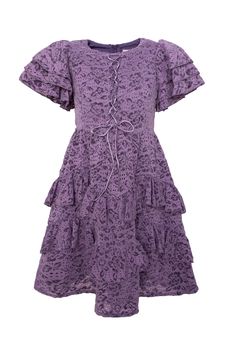 Looking for a modest girl's dress for your next big event? Allow us to introduce you to our Mini Solana Dress! Made from a vibrant purple lace burnout fabric, this dress features a square neckline and short flutter sleeves. The midi-length ruffle tiered skirt adds a touch of playfulness and includes functional pockets, while the hidden back zipper and front corset create a perfect, stylish fit. Purple Lace Dress With Ruffles, Purple Lace Dresses With Ruffles, Purple Tiered Ruffle Hem Dress, Purple Tiered Dress With Ruffle Hem, Purple Short Sleeve Dress With Lace Trim, Purple Fitted Dress With Flutter Sleeves, Fitted Purple Dress With Flutter Sleeves, Fitted Purple Dresses With Flutter Sleeves, Purple Flutter Sleeve Dress For Summer