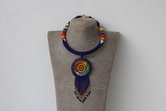 African beaded necklaces for women, Zulu necklace, Beaded women jewelry, Pendant necklace, Christmas gift for her, Moms gift, Boho necklace An elegant necklace that can compliments any outfit. Handmade in Kenya using fine beads. Color: dark blue Necklace length: 9 inches 3-5 days delivery via DHL Express.  Pay shipping fee for the first item only and additional items ship for FREE. To view more items in our shop, kindly click here:  nkoroicrafts.etsy.com Gift Beaded Necklace With Large Beads And Round Pendant, Beaded Necklaces With Dangling Pendant Beads As A Gift, Dangling Beads Pendant Necklace Gift, Gift Beaded Necklace With Dangling Pendant, Zulu Necklace, Dichroic Jewelry, Fabric Necklace, Necklace Patterns, Beaded Pendant Necklace