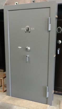 a large gray metal safe in a room