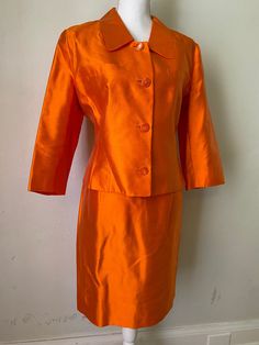 "Amazing rare vintage LANVIN silk blazer & skirt set in mandarin orange silk taffeta. Highest quality that you expect from this couture label. Love the shorter length of the jacket for a cropped look - skirt would be awesome hemmed to a mini length, easy alteration. Functional breast pockets on jacket, but have not been opened. Both pieces fully lined in silk. No wear noted. Stunning worn separately or together!  Made by LANVIN Paris  Marked size 44 - modern size medium to large.  Measurements ( Cake Makeover, Vintage Lanvin, Blazer Skirt Set, Orange Suit, Orange Blazer, Blazer And Skirt Set, Silk Blazer, Look Rock, Ruffle Mini Skirt