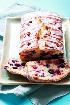 a loaf of lemon blueberry bread on a plate