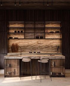 a kitchen with two stools next to a counter top and shelves on the wall