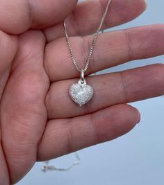 This beautiful heart charm necklace makes a perfect gift for that special person in your life and also a great gift for lovers of modern and minimalist jewelry. 💕 Approximately 1mm box chain (choice your length) Pendant  Height: 10.7mm Width: 11.8mm Thickness: 4.4mm Bail opening: 4mm Metal: 925 Sterling Silver ⭐️Free silver polishing cloth  ⭐️ It's completely natural for sterling silver to oxidize over time when it's exposed to air. Please, keep them in airtight plastic bag and use sterling silver polishing cloth to make them shine like new again. ⭐️ Each piece is packed in its own drawstring pouch and ordered is mailed out in bubble mailers to avoid any damages that can happen during transportation. Valentine's Day Necklace With Box Chain And Heart Pendant, Valentine's Day Diamond Cut Jewelry Gift, Valentine's Day Gift Diamond Cut Jewelry, Valentine's Day Gift Heart Necklace With Box Chain, Gift Heart Pendant Jewelry With Box Chain, Valentine's Day Heart Pendant Necklace With Box Chain, White Gold Heart Cut Necklace Gift For Her, Valentine's Day Heart Necklace With Box Chain, White Gold Heart Cut Necklace As Gift For Her