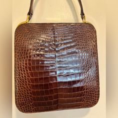 Beautiful Vintage Crocodile Rendl Original Handbag In Dark Brown Color With Gold Hardware. See Pictures For Signs Of Wear, Happy To Answer Any Questions About The Bag. Formal Square Bag With Crocodile Pattern, Formal Square Bags With Crocodile Pattern, Classic Crocodile Pattern Shoulder Bag For Formal Occasions, Classic Formal Shoulder Bag With Crocodile Pattern, Formal Handheld Shoulder Bag With Crocodile Pattern, Formal Square Shoulder Bag With Crocodile Pattern, Formal Handheld Crocodile Pattern Shoulder Bag, Formal Rectangular Bag With Crocodile Pattern, Formal Crocodile Pattern Tote Shoulder Bag