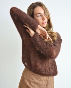 Hello, I'm the one, who won't let you down - coffee brown mohair sweater. I will comfort you, keep you warm and will make you smile. I'm 100% hand made and proud of that. I consist of 70% italian kid mohair and 30% of nylon, which makes me incredibly natural. I'm quite unique as could be worn all year long. I'm in one size and one size fits all because my measurements are : ❤️ Width -47 cm ❤️ Lengths -47-48 cm If you would like me in other size, you could request a custom order with your own par Cozy Brown Chunky Knit Cropped Sweater, Brown Oversized Open Knit Sweater, Oversized Brown Open Knit Sweater, Brown Mohair Knitted Sweater, Cozy Brown Mohair Sweater, Cozy Brown Open Knit Sweater, Bohemian Chunky Knit Brown Sweater, Bohemian Brown Chunky Knit Sweater, Brown Soft Knit Cropped Sweater For Winter