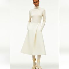 Zara Tulip Skirt Limited Edition Elegant Long-skirt Winter Dresses, Elegant Long Winter Dress, Elegant White Skirt For Fall, Winter White Chic Skirt, Chic White Winter Skirt, White Midi Skirt For Winter, Elegant Winter Dress With Flared Skirt, White Flared Skirt For Winter, Elegant Cream Stretch Skirt