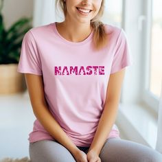 "Namaste t-shirt for women, Yoga shirt gift for girlfriend, Yoga tshirt for bestfriend, Namaste spiritual shirt, Meditation shirt for yoga lover This t-shirt says Namaste, the greeting of peace and harmony. It's a great way to express your passion for yoga and meditation. Or as a thoughtful gift for any yoga lover in your life. \" An extraordinarily imaginative print, the shirt was delivered very quickly and the recipient is totally happy with it. Thanks very much! \" 💛 M. If you like this design, check out all our other cool designs here: https://etsy.me/3QcjoYW Love tote bags? Find them here: https://etsy.me/3H8CwUI Size: For accurate fit we recommend measuring one of your own t-shirts and comparing sizes with our size guide in the listing photos above. S M L XL 1XL 2XL 3XL This is a ma Spring Casual Yoga T-shirt, Yoga Style Outfits, Crew Neck T-shirt For Yoga, Cheap Relaxed Fit Yoga T-shirt, Spiritual Shirts, Breathable Yoga T-shirt In Solid Color, Yoga Shirt, Yoga And Meditation, Namaste Yoga