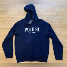 Polo Ralph Lauren Men’s Polo Rl 67 Script Fleece Pullover Hoodie Blue Nwt M - L Blue Fleece Tops With Logo Print, Blue Fleece Sweatshirt With Logo Print, Blue Fleece Sweatshirt With Logo, Blue Sporty Sweatshirt With Branding, Navy Long Sleeve Sportswear Hoodie, Blue Branded Winter Sweatshirt, Sporty Blue Hoodie With Branding, Winter Blue Branded Sweatshirt, Winter Blue Sweatshirt With Branding