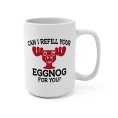 a white coffee mug with the words can i refill your eggnog for you?