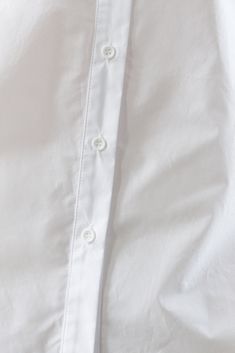 A solid poplin top with shirt collar and button downDetails:Self : 100% CottonSize & Fit- Model is 5`9" And Wearing Size Small- Measurements Taken From Size Small- Approx. Length: 24" Summer Button-up Poplin Shirt, Summer Poplin Button-up Shirt, Collared Poplin Top With Button Closure, Collared Poplin Tops With Button Closure, Poplin Button-up Shirt With Buttons, Spring Poplin Shirt With Button Closure, Daywear Poplin Tops With Button Closure, Poplin Tops With Button Closure For Daywear, Daywear Tops With Button Closure