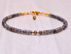 Mystic Labradorite Bracelet, Gemstone Bracelet, Sparkly Beaded Bracelet, Labradorite Jewelry, Handmade Jewelry, Gold Bracelet, Gift for Her This bracelet is very dainty - beads measure about 3-4mm apiece AAA Quality Please Feel Free To Contact If You Have Any Query. Orders are shipped within 1 business working day, excluding orders made on Sunday or national holidays. Domestic delivery takes 5-7 business days. International delivery takes 11-23 business days. PAYMENT METHOD : PayPal only Please send all payments within 7 days . Return policy: We are very confident on our fine jewelry will meet your expectations, your satisfaction is our priority. However, if for any reason you are not satisfied with our product, you may return your order within 14 days from the date of shipment. The item m Adjustable Beaded Labradorite Bracelets, Bohemian Labradorite Bracelets With Round Beads, Bohemian Labradorite Round Bead Bracelets, Handmade Adjustable Labradorite Beaded Bracelets, Handmade Labradorite Beaded Bracelets As A Gift, Adjustable Labradorite Gemstone Beads Bracelets, Spiritual Labradorite Beaded Bracelets, Gold Beaded Labradorite Bracelets, Gold Beaded Labradorite Bracelet