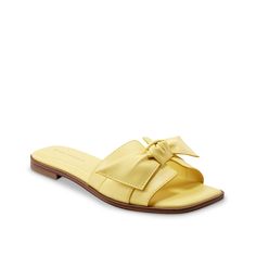 Marc Fisher-Finey Sandal The Finey sandal from Marc Fisher adds a feminine flair to a casual silhouette. Crafted with a classic slide style, this pair is complete with a sweet bow detail on the strap and a trendy square toe. Feminine Synthetic Sandals With Bow, Casual Summer Sandals With Bow, Casual Bow Sandals For Summer, Bow Sandals For Summer, Summer Sandals With Bow Detail, Summer Sandals With Bow, Trendy Bow Sandals For Summer, Trendy Summer Sandals With Bow, Flat Sandals With Bow For Summer