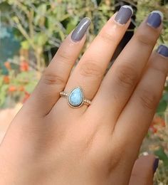 Handmade Larimar bohemian ring  , you can wear this ring as a party wear ring .. Title - Larimar stone ring  Stone color - Blue  Stone shape - Pear Material - Sterling silver 925 Note - We use natural gemstones, so color shade may be little bit different .. we are giving you best quality rings on best price .. contact us for more quantity Bohemian Crystal Promise Ring Stamped 925, Bohemian Sterling Silver Opal Ring, Bohemian Crystal Toe Ring For Anniversary, Silver Teardrop Bohemian Rings, Bohemian Sterling Silver Open Opal Ring, Bohemian Moonstone Promise Ring Stamped 925, Bohemian Teardrop Rings For Anniversary, Bohemian Teardrop Anniversary Rings, Bohemian Sterling Silver Opal Promise Ring