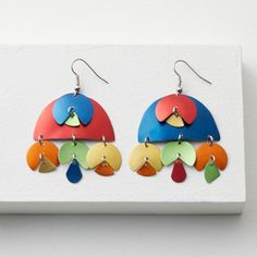 Aluminum Earrings - These eye-catching anodized aluminum earrings are subtly mismatched, with the colors reversed from one side to the other. The articulated fringe flutters and dances with the slightest movements, adding a playful touch to the handcrafted pair. Surgical steel French hooks. Modern Multicolor Dangle Earrings, Modernist Metal Earrings As Gift, Playful Flower-shaped Spring Earrings, Artistic Enamel Drop Earrings, Silver Flower-shaped Enamel Earrings, Anodized Aluminum Jewelry, Artistic Enamel Earrings Nickel-free, Aluminum Earrings, Lotus Earrings