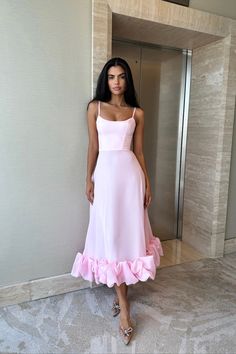 Flounce Bustier Midi Dress in Light Pink. The corset with bones and cups flatters the body shape while the flounce in the bottom creates a dreamy and romantic feel. The dress fastens with a hidden zipper. Lined. Pink Engagement Dress, Bustier Midi Dress, Pink Engagement, Midi Bridesmaid Dress, Satin Long Sleeve, Engagement Dresses, Body Shape, Color Light, Hidden Zipper