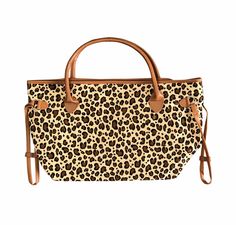 Cheetah printed handbag Fashionable and elegant Dimensions: 19.5 inch wide and 12 inches height Rectangular Leopard Print Bags For Daily Use, Leopard Print Crossbody Travel Bag, Large Capacity Leopard Print Bag For Shopping, Trendy Leopard Print Bag For Daily Use, Leopard Print Rectangular Shopping Bag, Casual Leopard Print Tote Bag, Spacious Leopard Print Bag For Daily Use, Travel Leopard Print Shoulder Bag, Leopard Print Rectangular Bag For Everyday Use