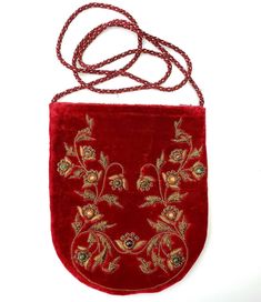 "This red velvet slim phone crossbody bag is perfectly sized to fit your phone, cards and cash, making it perfect for running errands, walking your dog, or heading out for the evening. Stylish travel purse, keeps your passport and documents organized in one place. OOAK, velvet, hand embroidered by master artisans in Agra, India, in the zardozi tradition, using metallic threads and genuine semi precious stones. Such a romantic bag! Unique. A keeper - red crushed velvet - hand embroidered with mat Large Bead Necklace, Cell Phone Pouch, Velvet Clutch, Agra India, Phone Cards, Medieval Costume, Travel Purse, Beaded Belt, Cabochons Stones